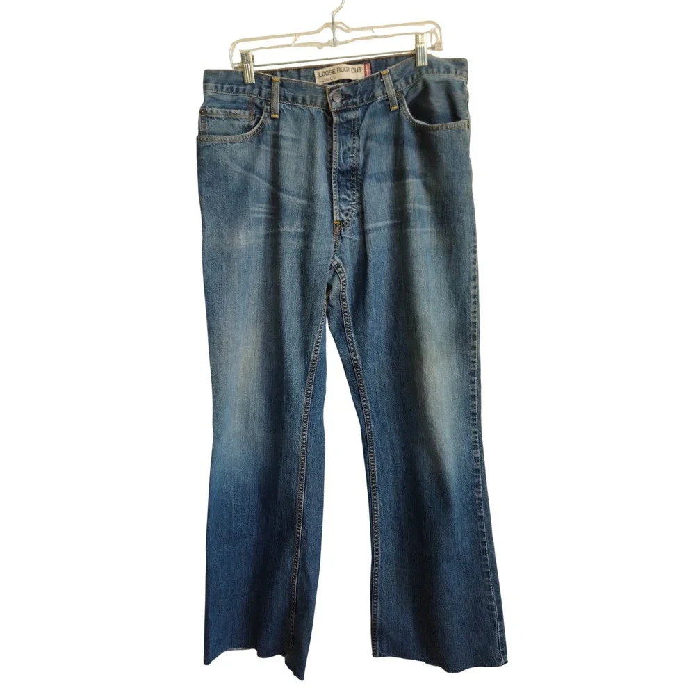 Vintage Levi's 567 Loose Boot Cut Jeans Button Fly Raw Hem Label 36x34 Act 34x31